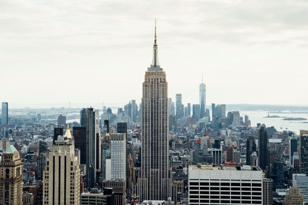 A stunning view of New York City's skyline featuring the Empire State Building during the day.